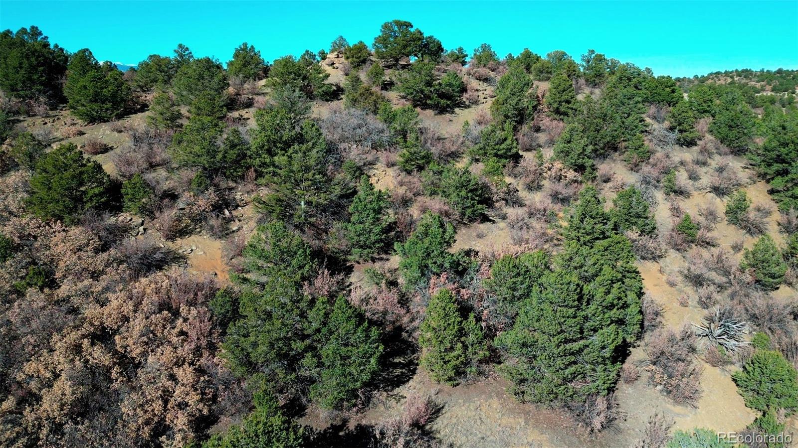 11298 Primero Ranch Trinidad, CO 81082 - Photo 27 of 36 an aerial view of a house with a yard