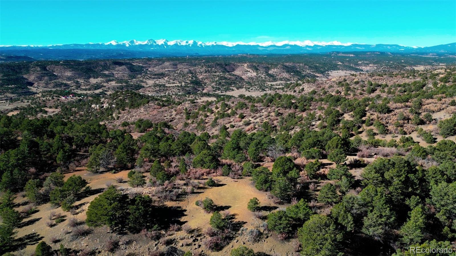 11298 Primero Ranch Trinidad, CO 81082 - Photo 7 of 36 an aerial view of a residential houses with outdoor space and trees