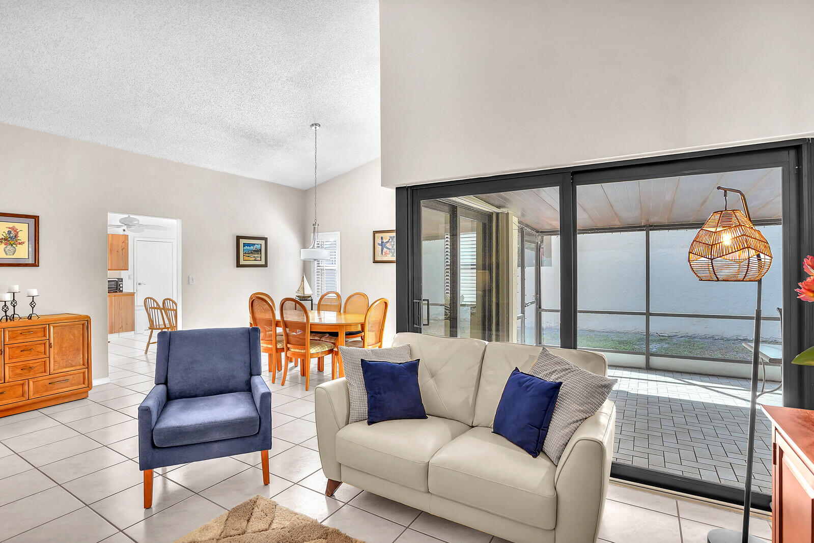 1550 Northwest 22nd Avenue Delray Beach, FL 33445 - Photo 14 of 44 a living room with furniture and a table