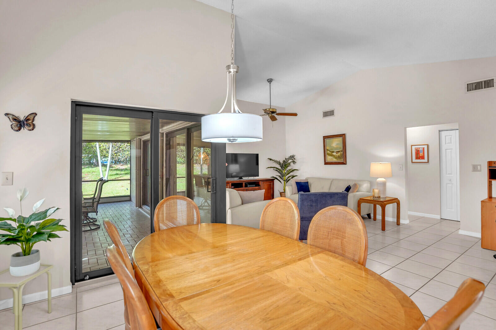 1550 Northwest 22nd Avenue Delray Beach, FL 33445 - Photo 16 of 44 a view of a dining room with furniture and window