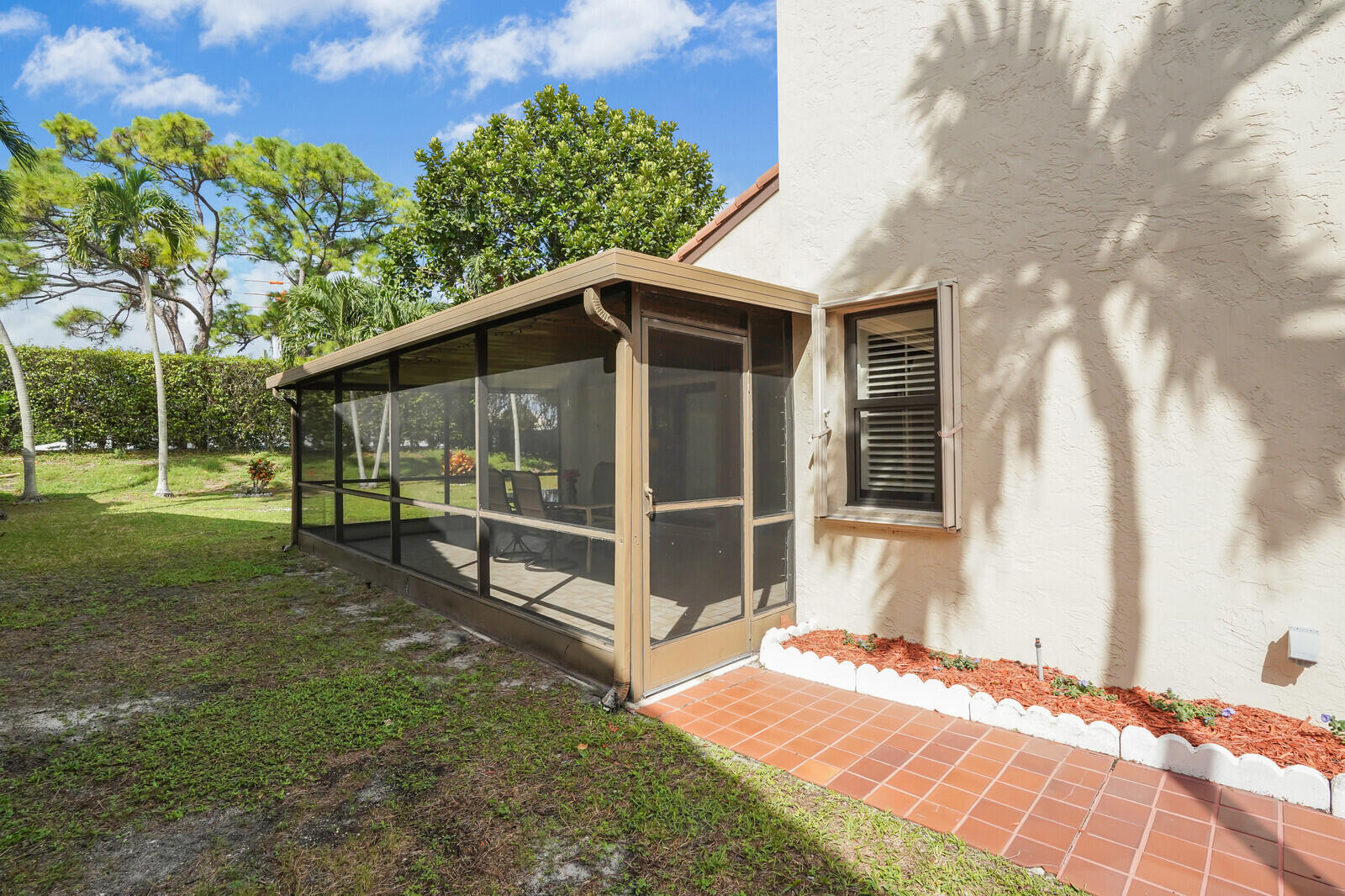 1550 Northwest 22nd Avenue Delray Beach, FL 33445 - Photo 34 of 44 a view of a house with a yard