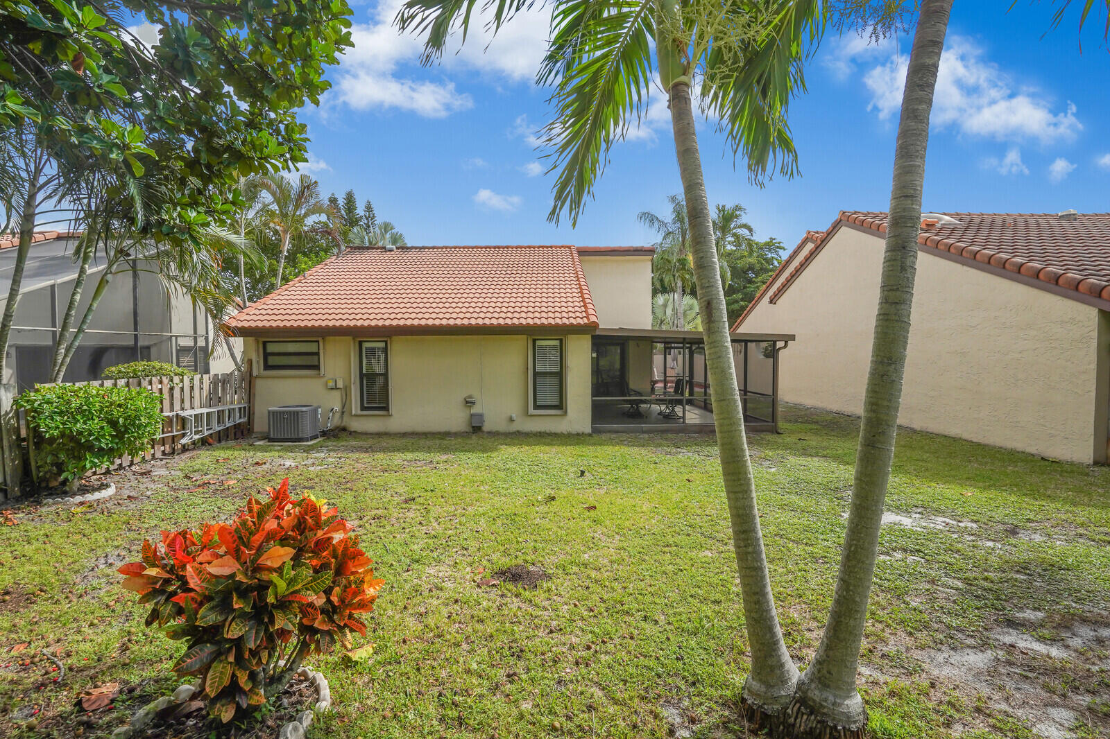 1550 Northwest 22nd Avenue Delray Beach, FL 33445 - Photo 37 of 44 a view of a house with pool and garden