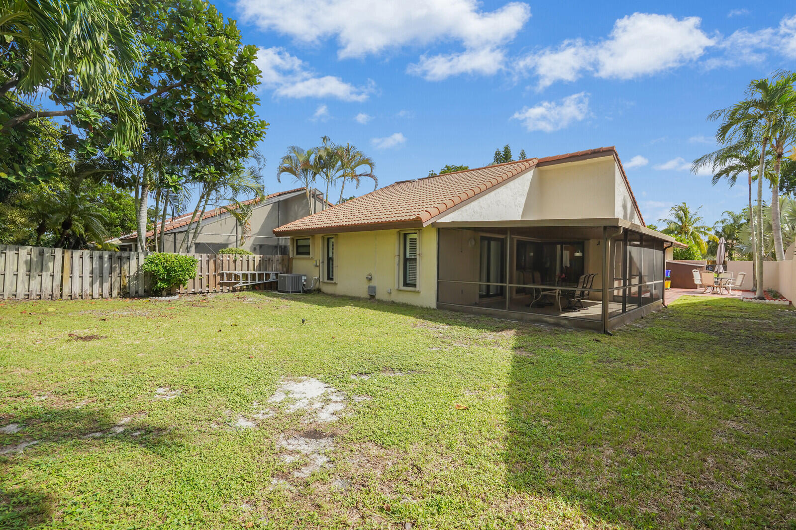 1550 Northwest 22nd Avenue Delray Beach, FL 33445 - Photo 38 of 44 a front view of a house with garden