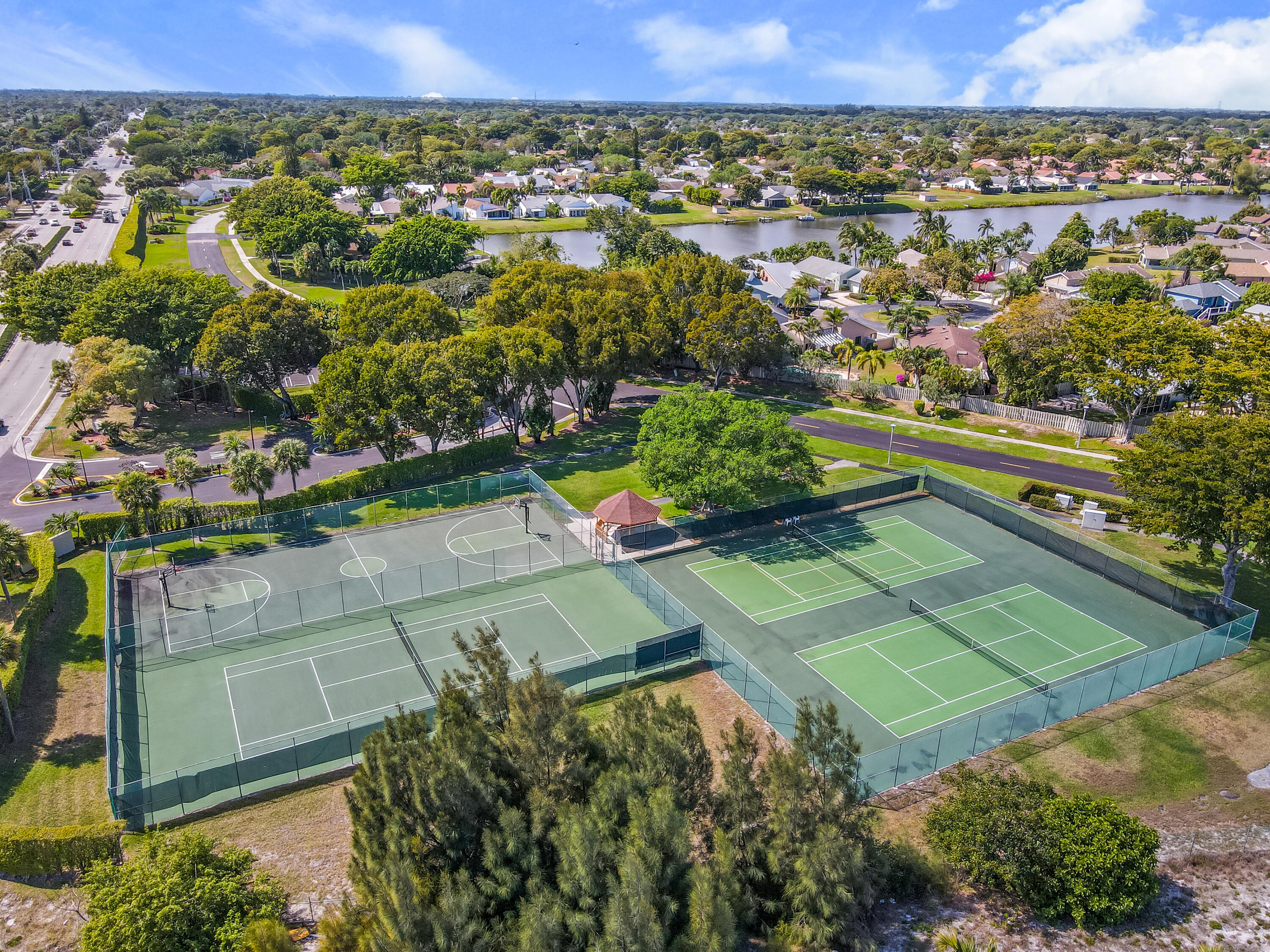 1550 Northwest 22nd Avenue Delray Beach, FL 33445 - Photo 44 of 44 an aerial view of a residential houses with outdoor space