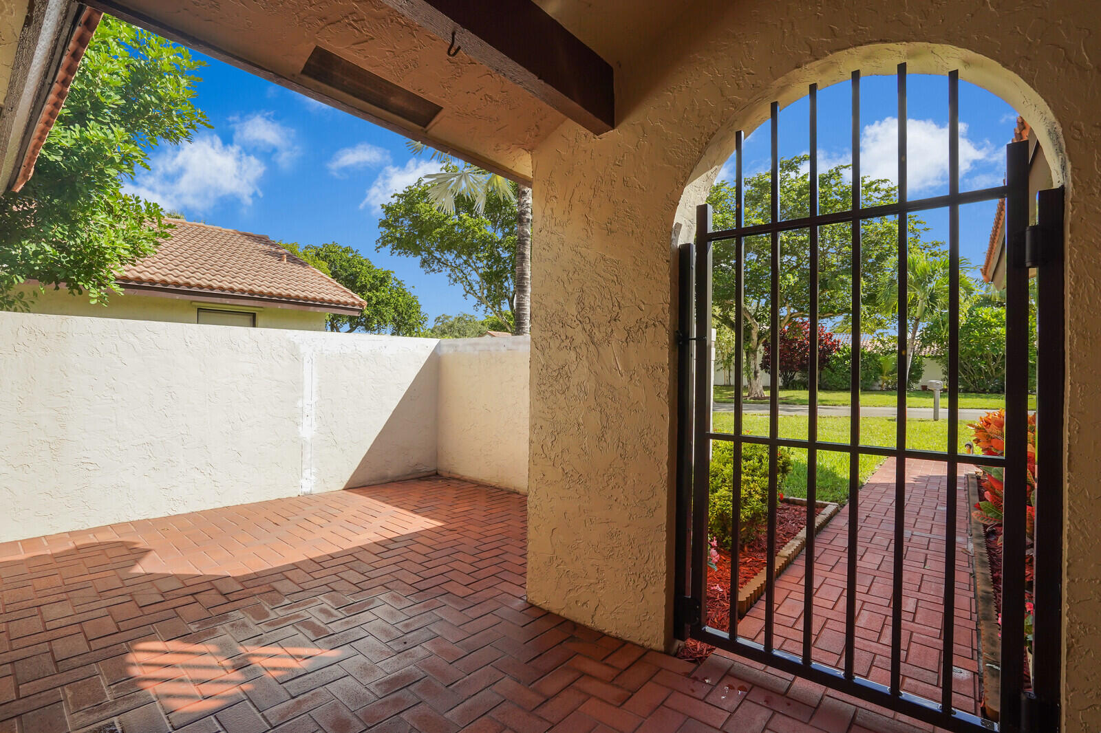 1550 Northwest 22nd Avenue Delray Beach, FL 33445 - Photo 7 of 44 a view of a balcony with a potted plant