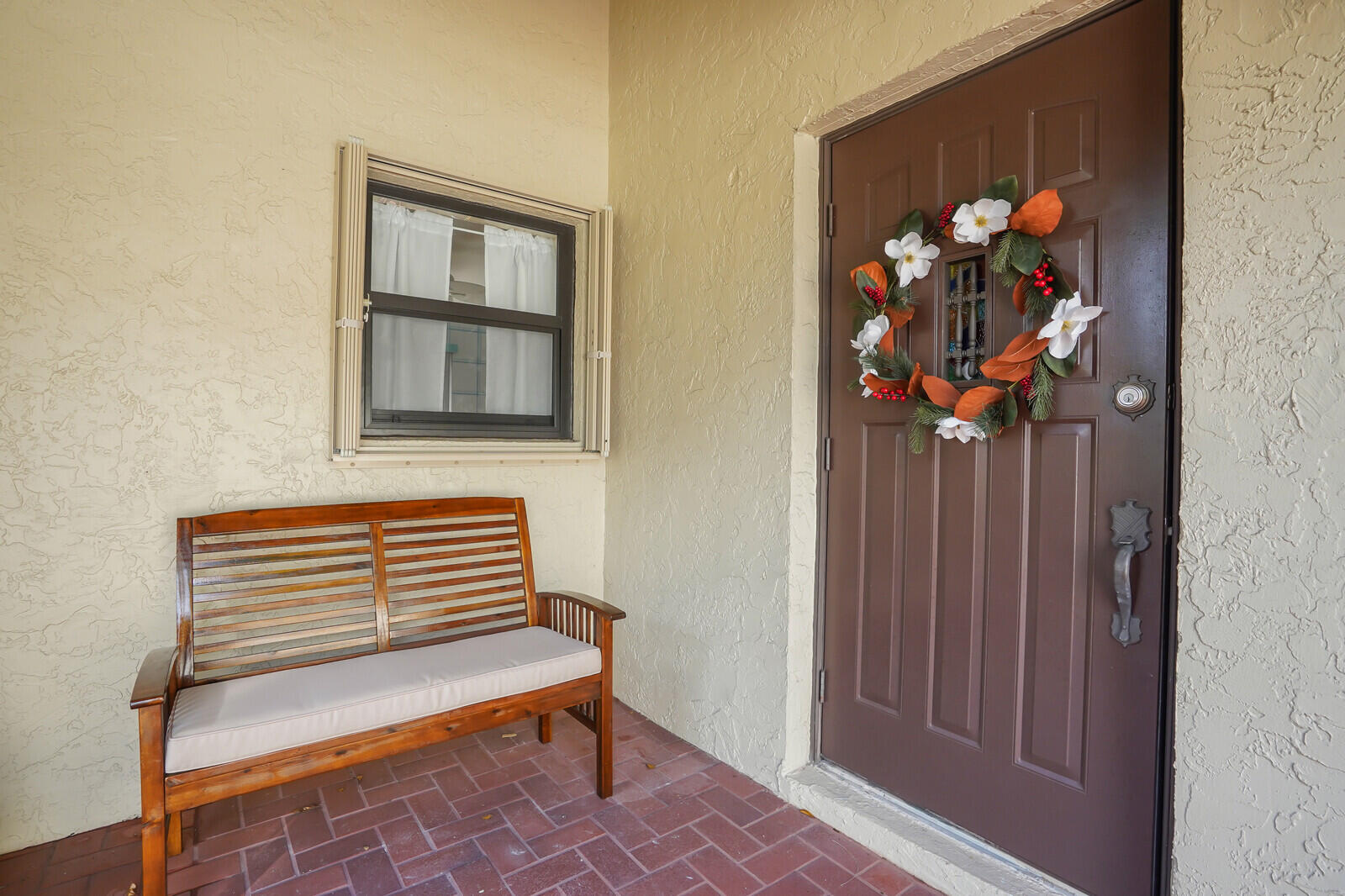 1550 Northwest 22nd Avenue Delray Beach, FL 33445 - Photo 8 of 44 a view of entryway with wooden floor