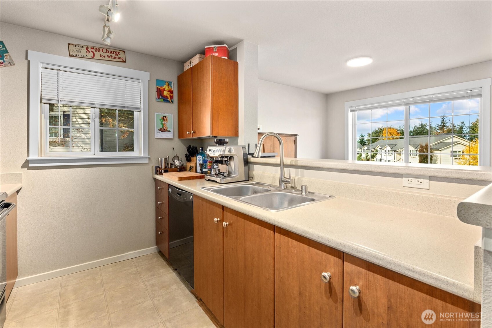 12404 East Gibson Road, Unit H301 Everett, WA 98204 - Photo 13 of 36 a bathroom with a sink and a window