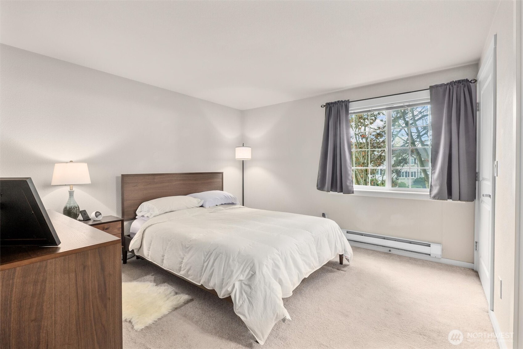 12404 East Gibson Road, Unit H301 Everett, WA 98204 - Photo 17 of 36 a bedroom with a bed and window