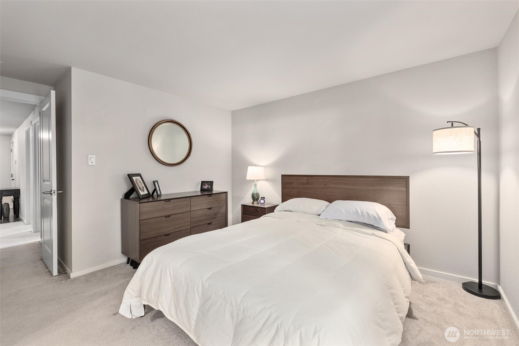 12404 East Gibson Road, Unit H301 Everett, WA 98204 - Photo 18 of 36 a bedroom with a bed and a closet