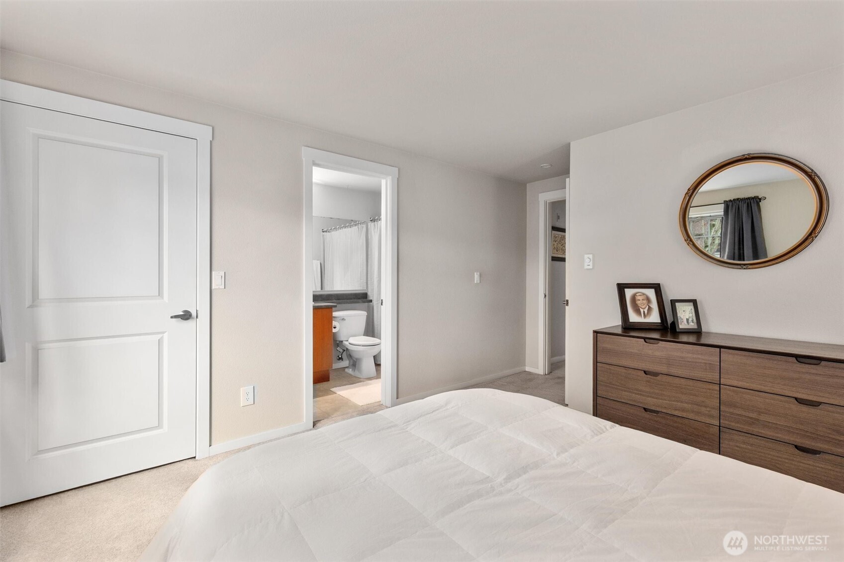 12404 East Gibson Road, Unit H301 Everett, WA 98204 - Photo 19 of 36 a bedroom with a bed and a sink