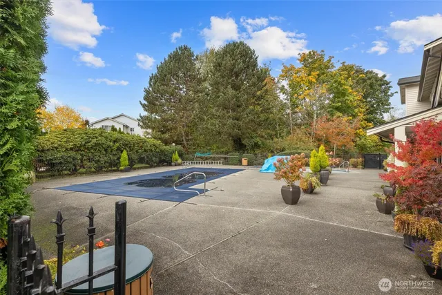 a view of a street with a building in the background