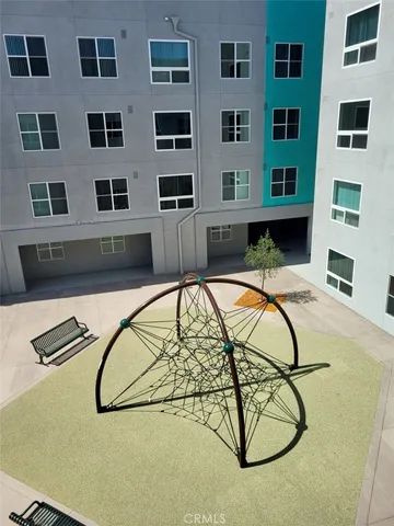 a view of swimming pool with seating space and furniture