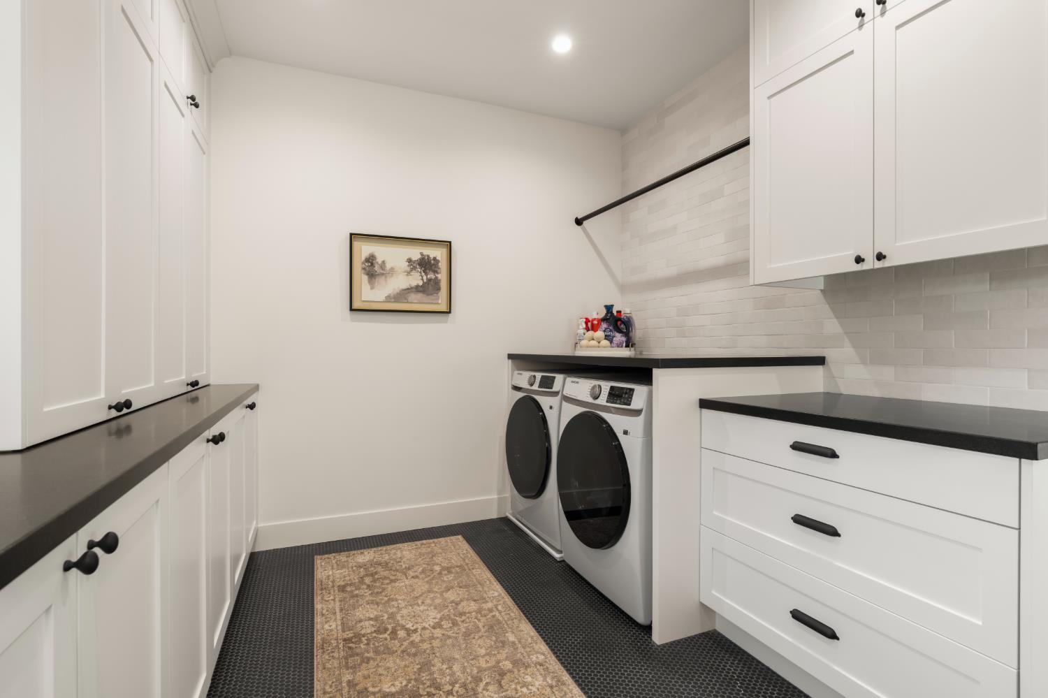 7697 Horseshoe Bar Road Loomis, CA 95650 - Photo 48 of 76 a utility room with dryer and washer