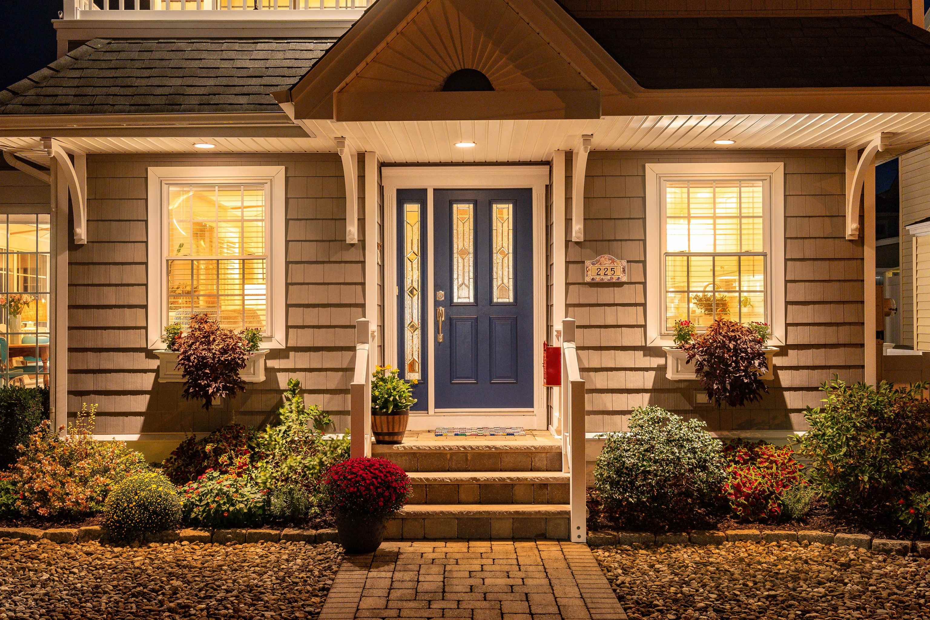 225 110th Street Stone Harbor, NJ 08247 - Photo 25 of 45 a front view of a house with a garden