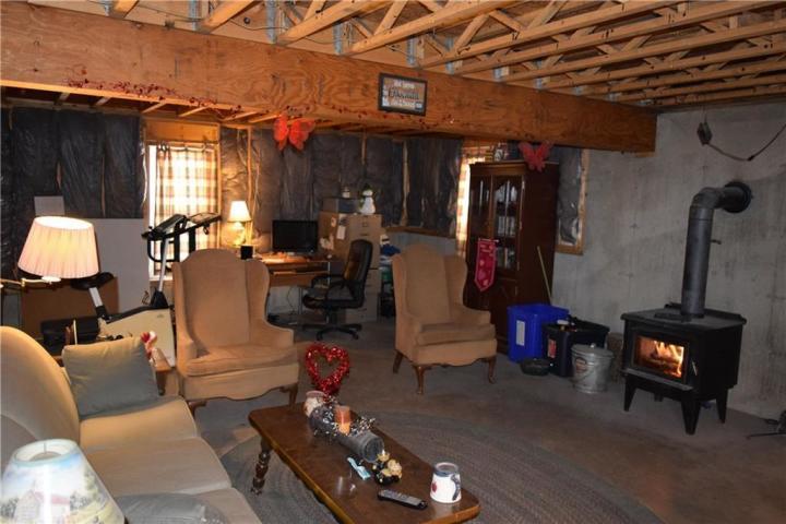 561 Union Hill Road Stow, ME 04037 - Photo 17 of 21 Basement with wood stove