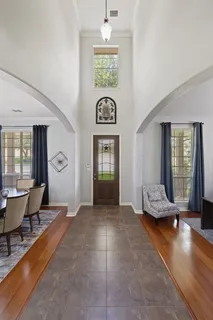 a living room with furniture and window