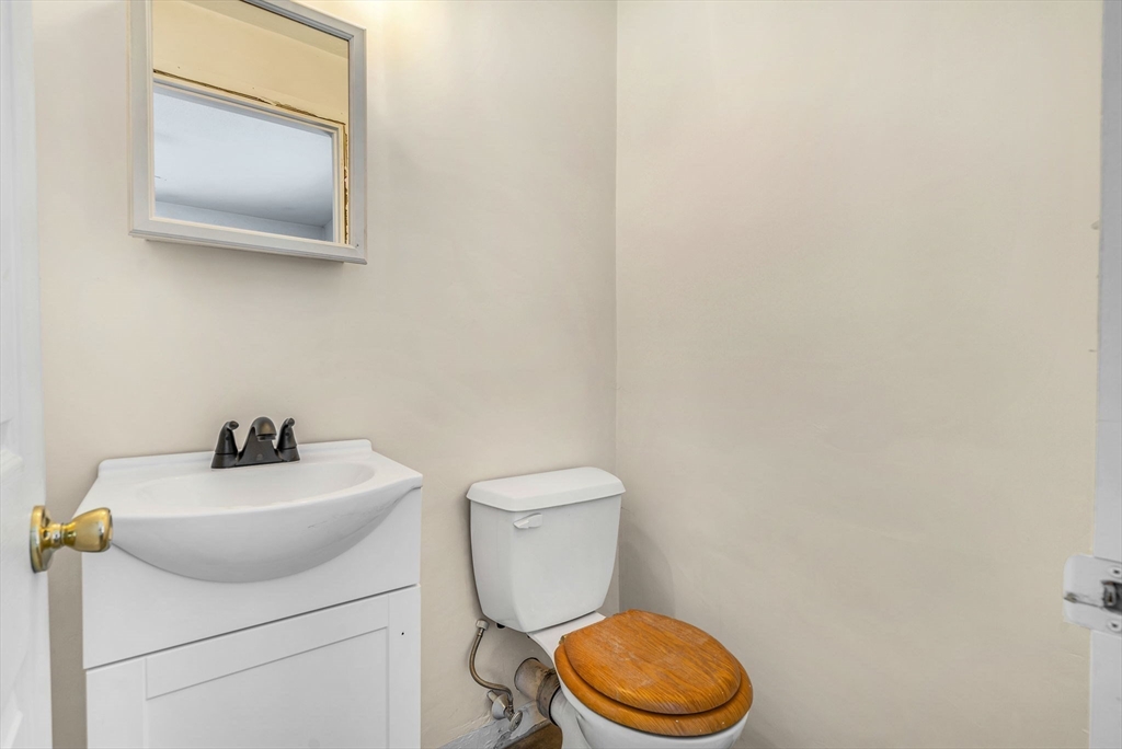 4 Temi Road Hudson, MA 01749 - Photo 18 of 23 a bathroom with a toilet a sink and mirror