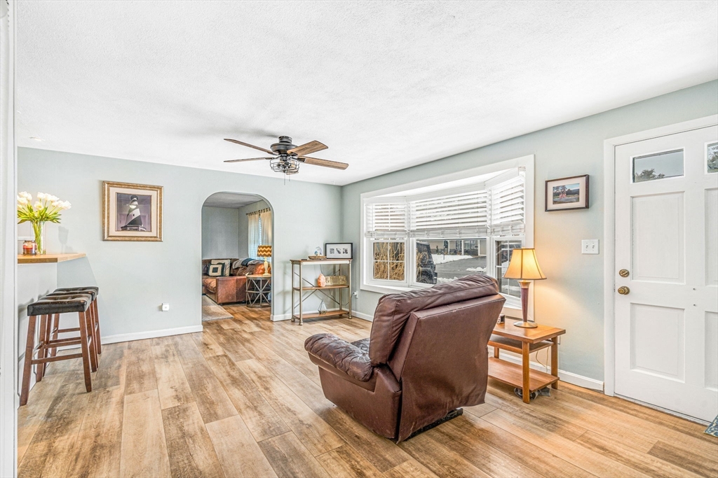 4 Temi Road Hudson, MA 01749 - Photo 2 of 23 a living room with furniture and a wooden floor