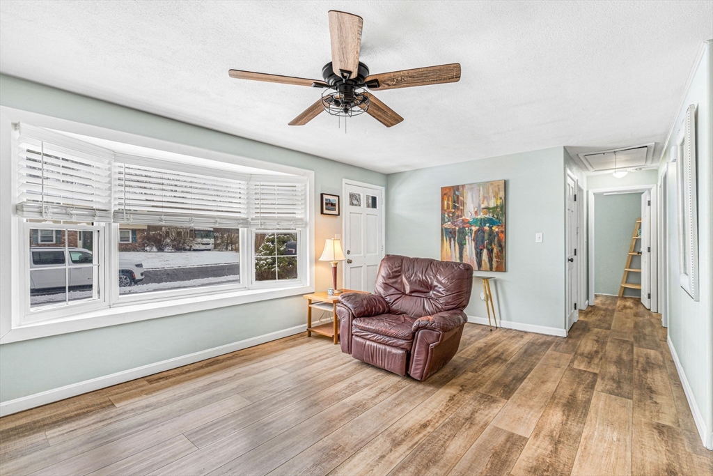 4 Temi Road Hudson, MA 01749 - Photo 3 of 23 a living room with furniture and a large window