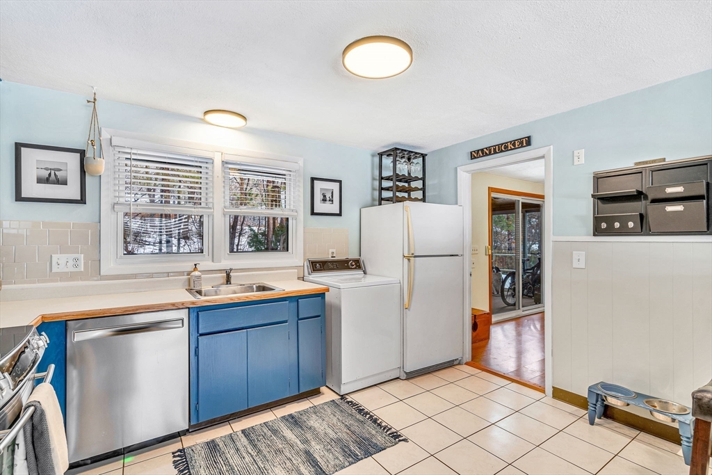 4 Temi Road Hudson, MA 01749 - Photo 6 of 23 a view of a kitchen with fridge and sink