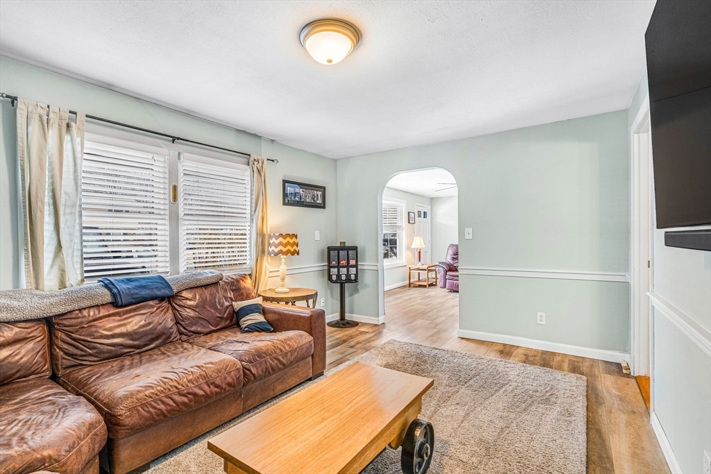 4 Temi Road Hudson, MA 01749 - Photo 10 of 23 a living room with furniture and a large window