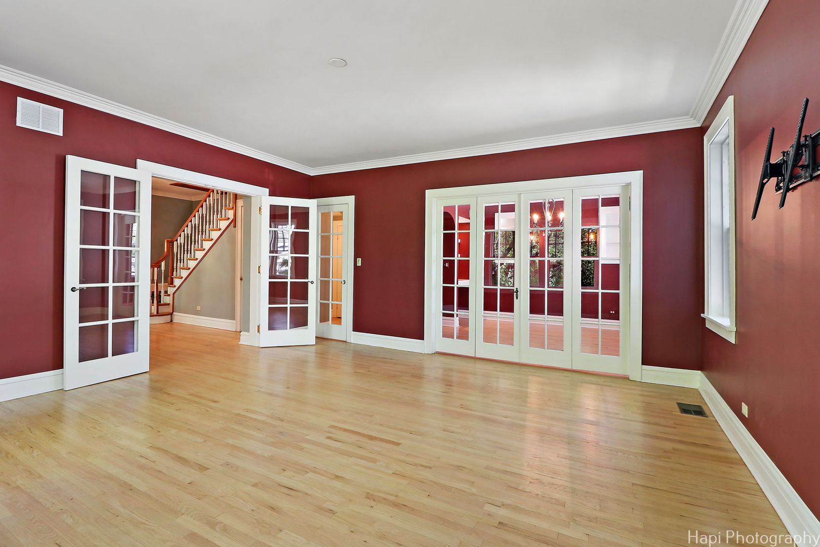 1403 Glenview Road Glenview, IL 60025 - Photo 19 of 62 a view of an empty room with wooden floor and a window