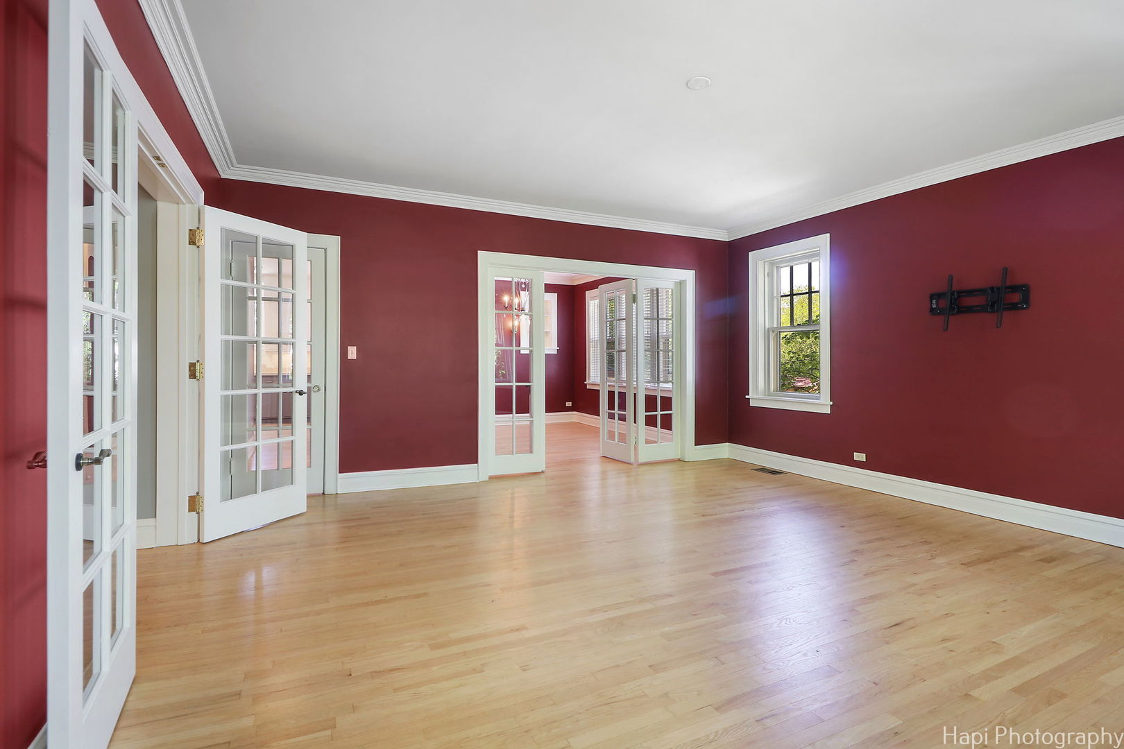 1403 Glenview Road Glenview, IL 60025 - Photo 20 of 62 a view of an empty room with window and wooden floor