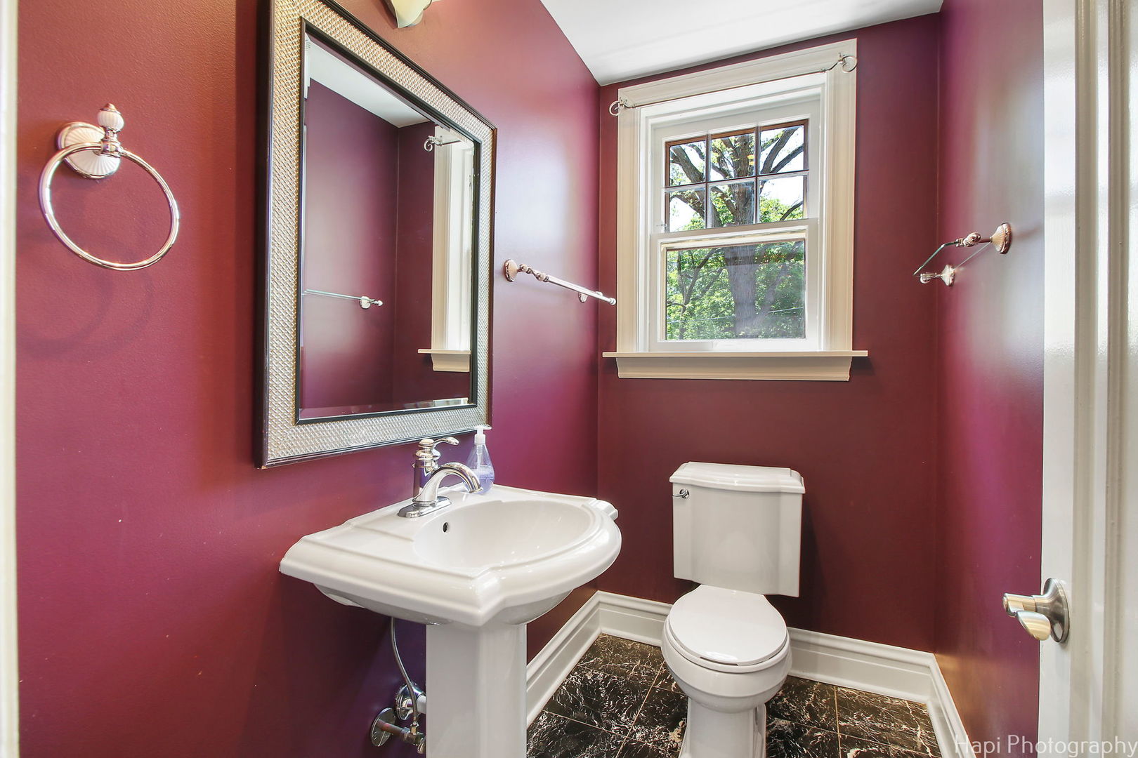 1403 Glenview Road Glenview, IL 60025 - Photo 25 of 62 a bathroom with a toilet sink and mirror