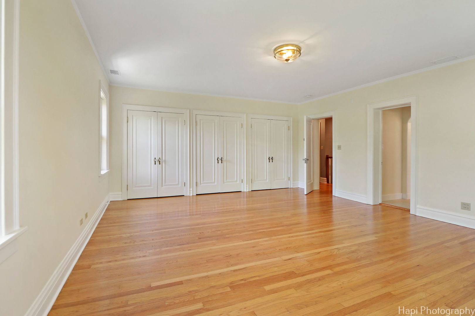 1403 Glenview Road Glenview, IL 60025 - Photo 28 of 62 a view of an empty room with wooden floor