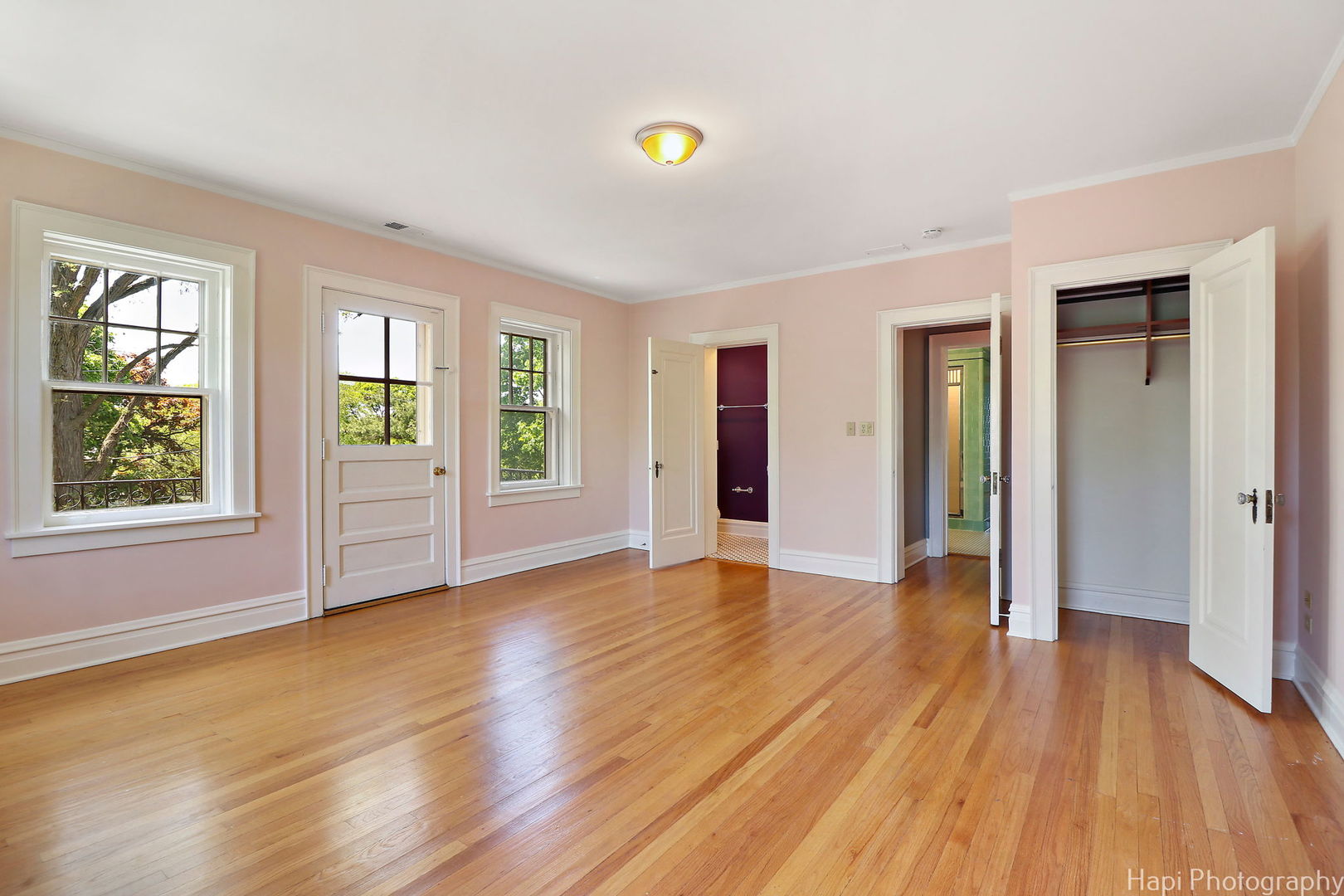 1403 Glenview Road Glenview, IL 60025 - Photo 34 of 62 an empty room with wooden floor and windows