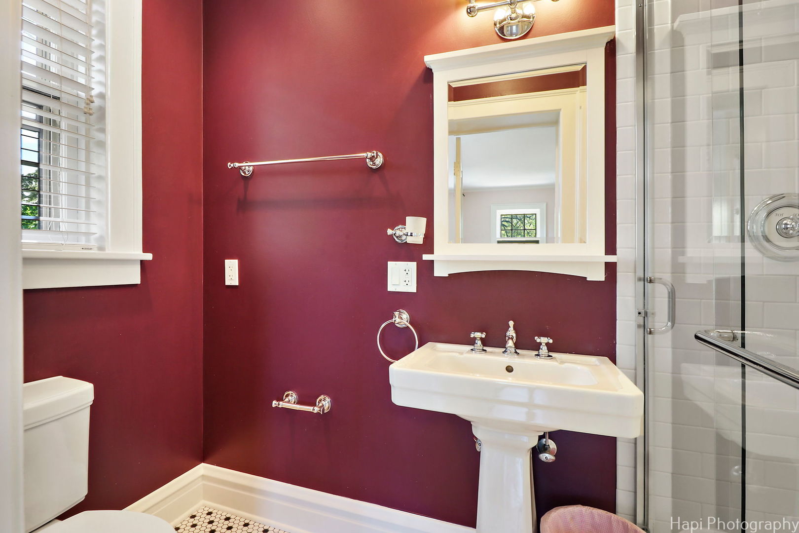 1403 Glenview Road Glenview, IL 60025 - Photo 35 of 62 a bathroom with a sink a toilet and mirror