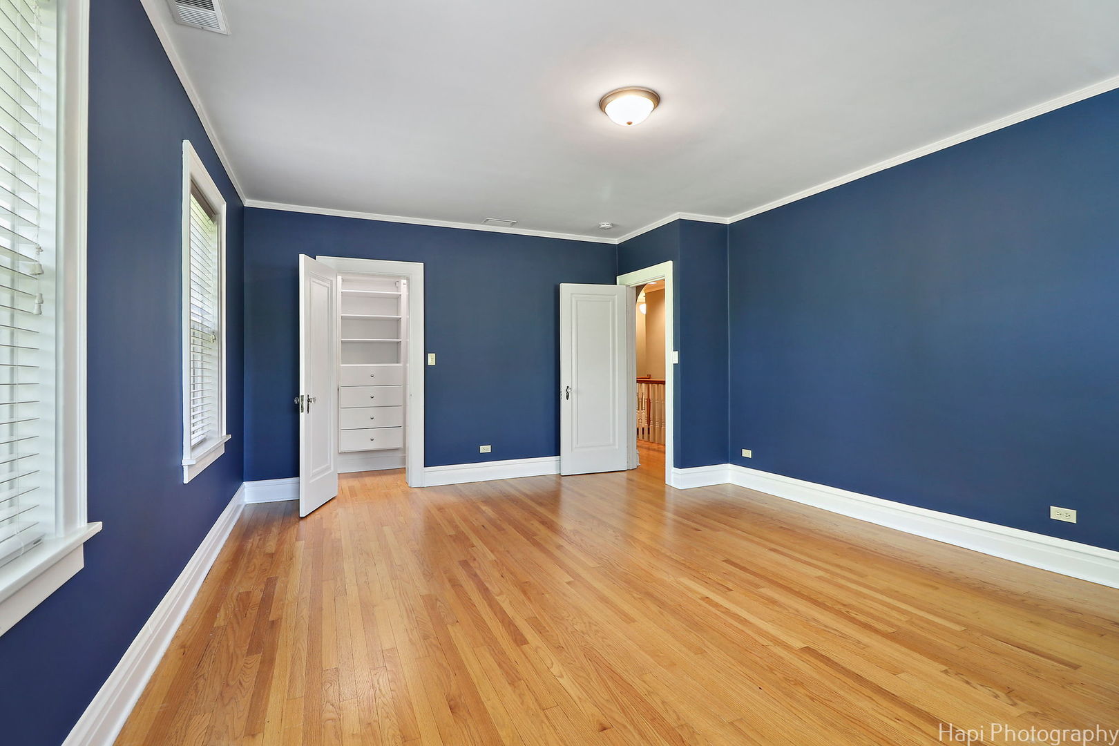 1403 Glenview Road Glenview, IL 60025 - Photo 39 of 62 a view of an empty room with wooden floor and a window