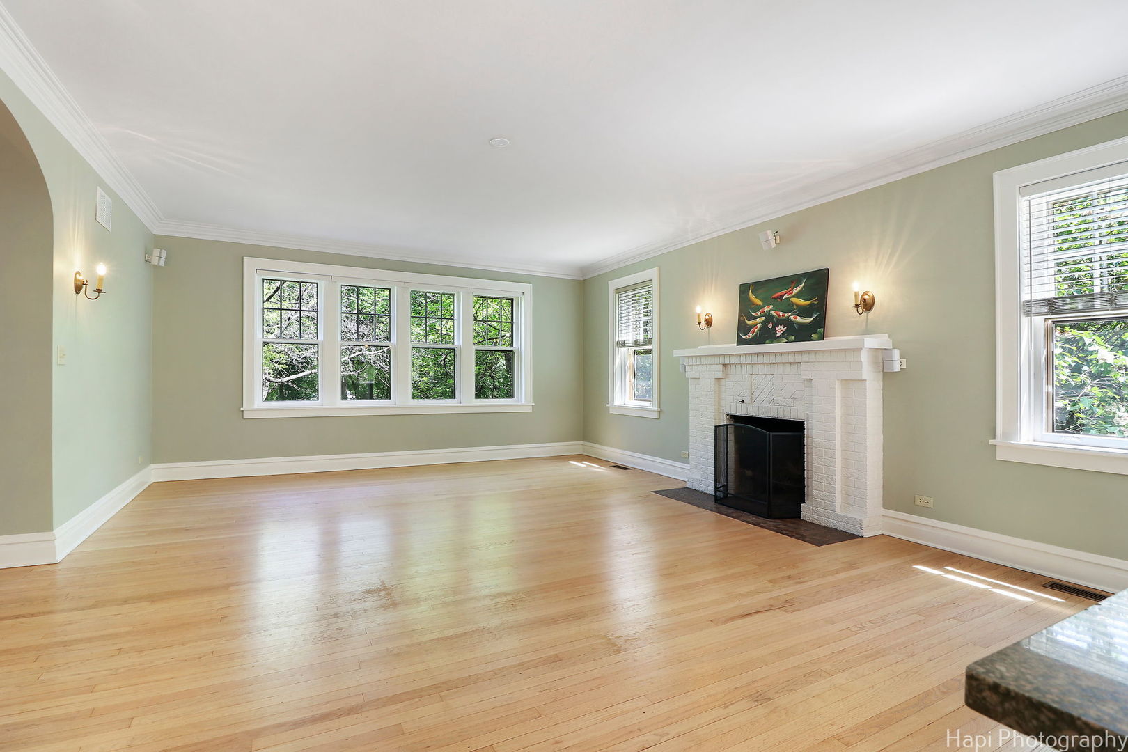 1403 Glenview Road Glenview, IL 60025 - Photo 8 of 62 a view of empty room with fireplace and wooden floor
