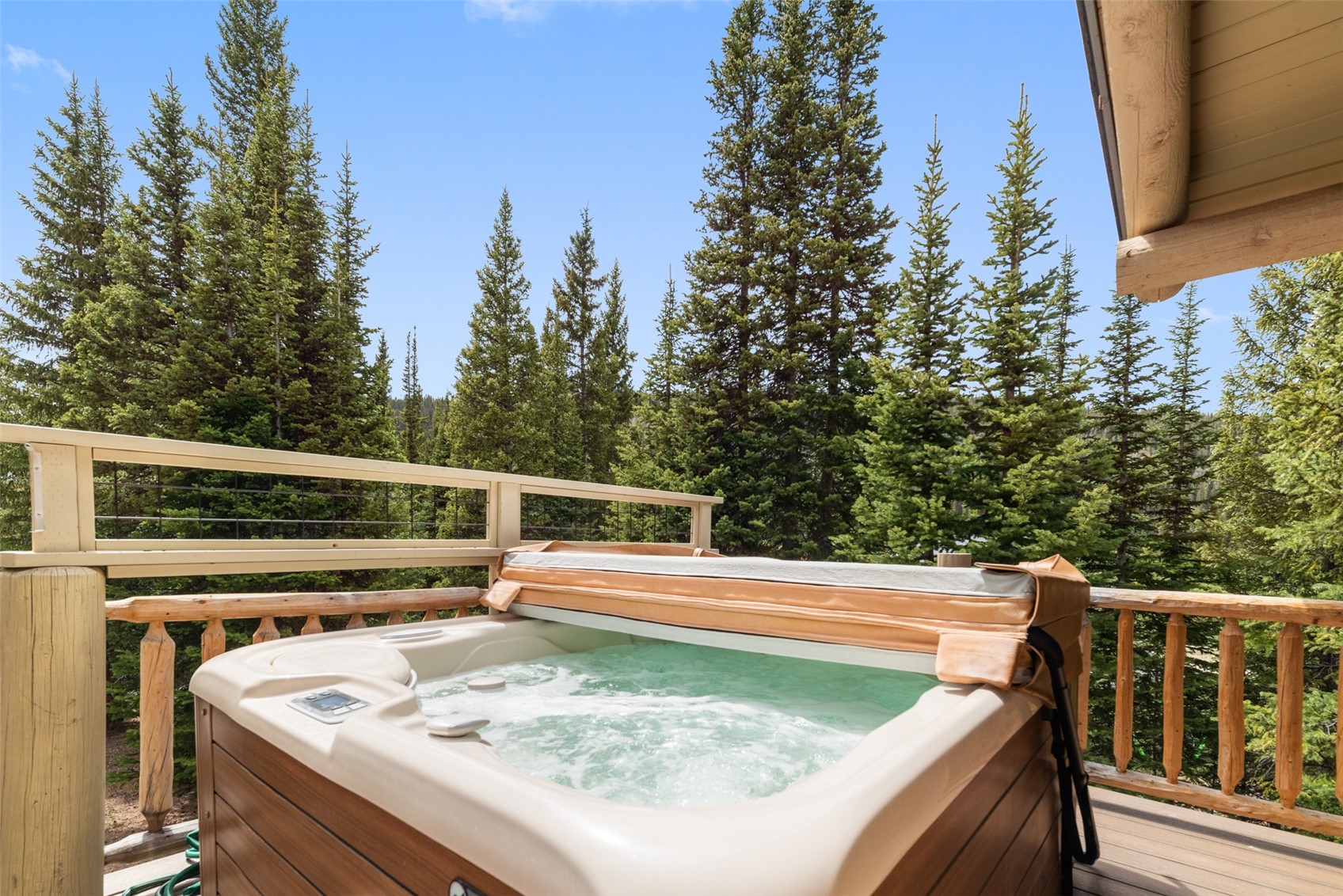 243 Rena Road Breckenridge, CO 80424 - Photo 5 of 50 Deck featuring a hot tub
