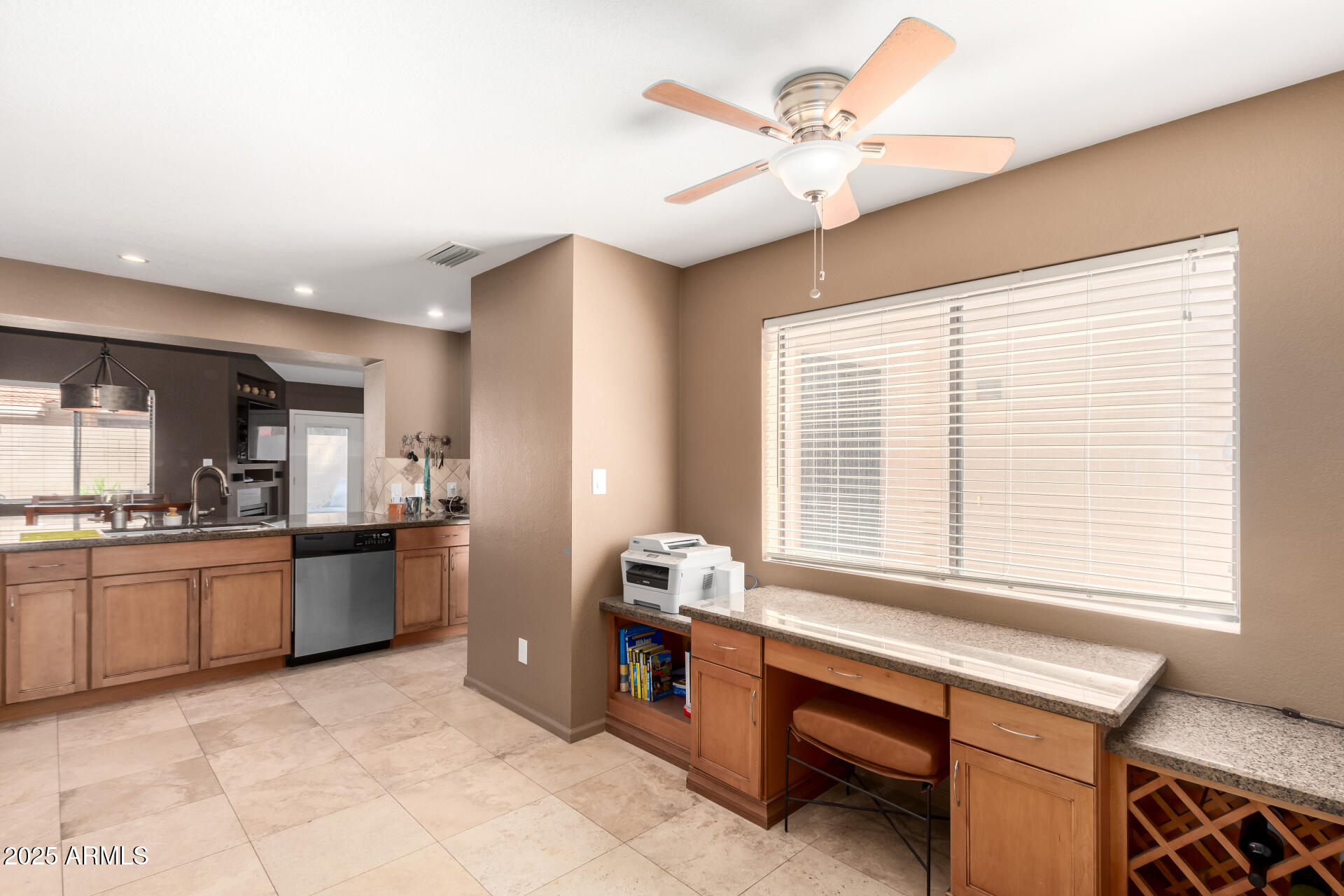 945 North Pasadena, Unit 62 Mesa, AZ 85201 - Photo 11 of 30 a kitchen with stainless steel appliances granite countertop a stove and cabinets