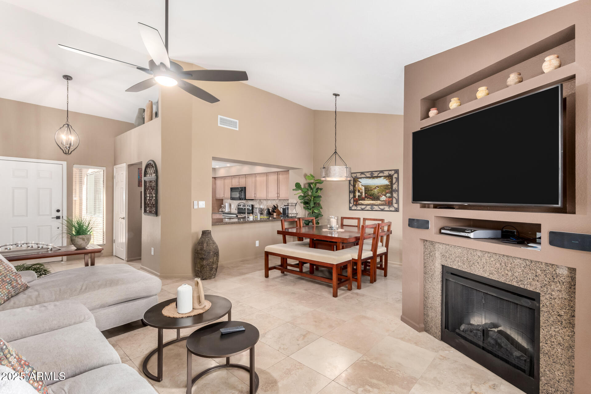 945 North Pasadena, Unit 62 Mesa, AZ 85201 - Photo 15 of 30 a living room with furniture and a flat screen tv