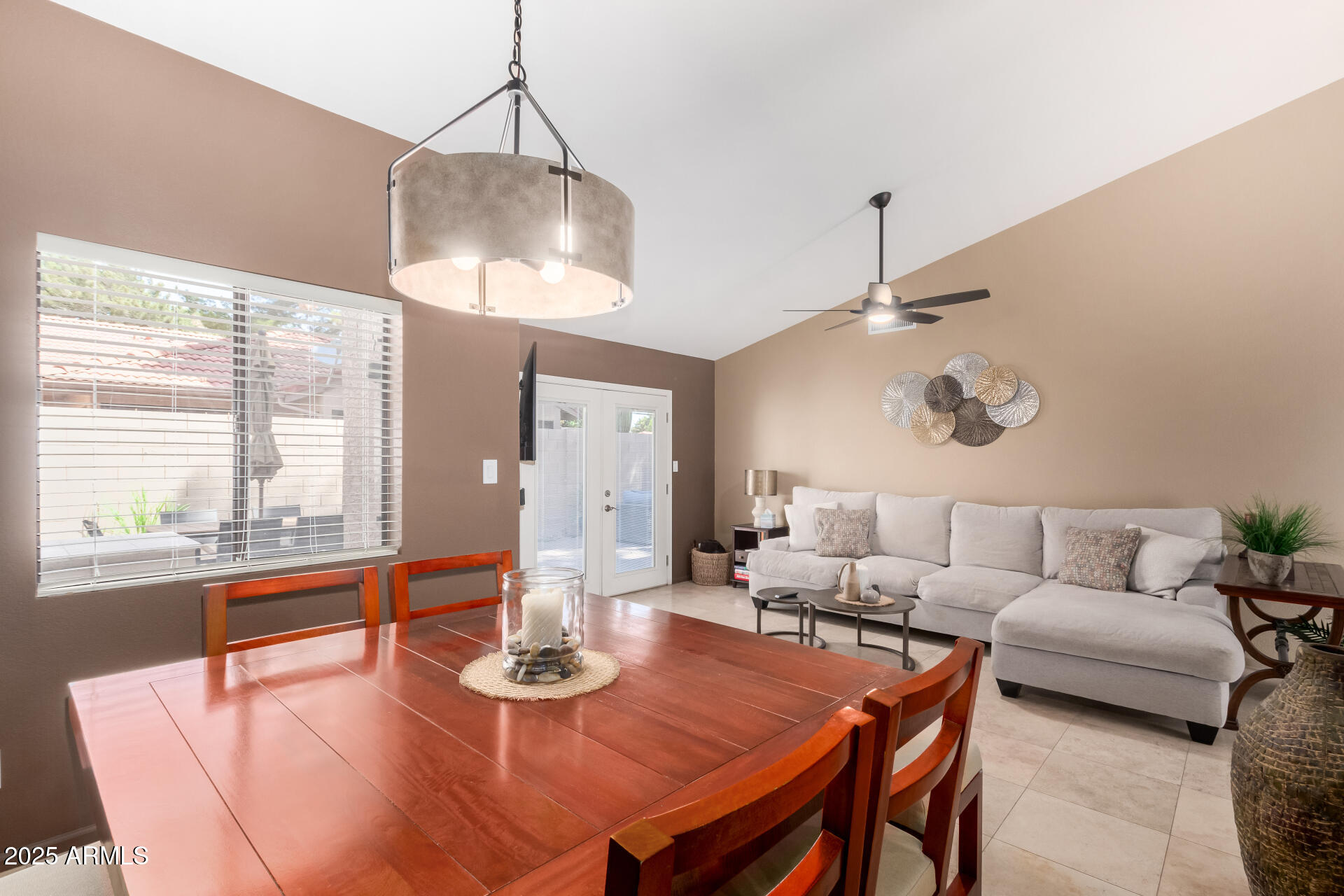 945 North Pasadena, Unit 62 Mesa, AZ 85201 - Photo 17 of 30 a living room with furniture a window and dining table