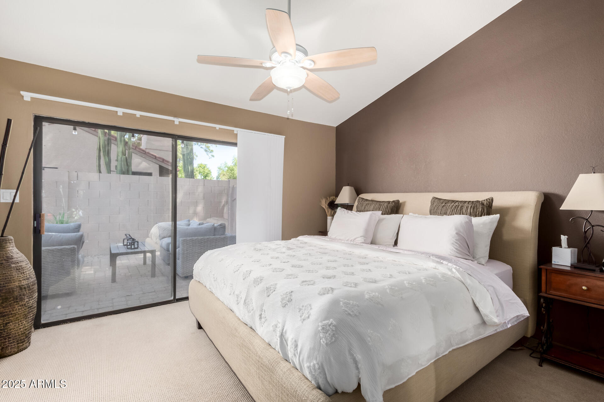 945 North Pasadena, Unit 62 Mesa, AZ 85201 - Photo 18 of 30 a large white bed sitting in a bedroom next to a window