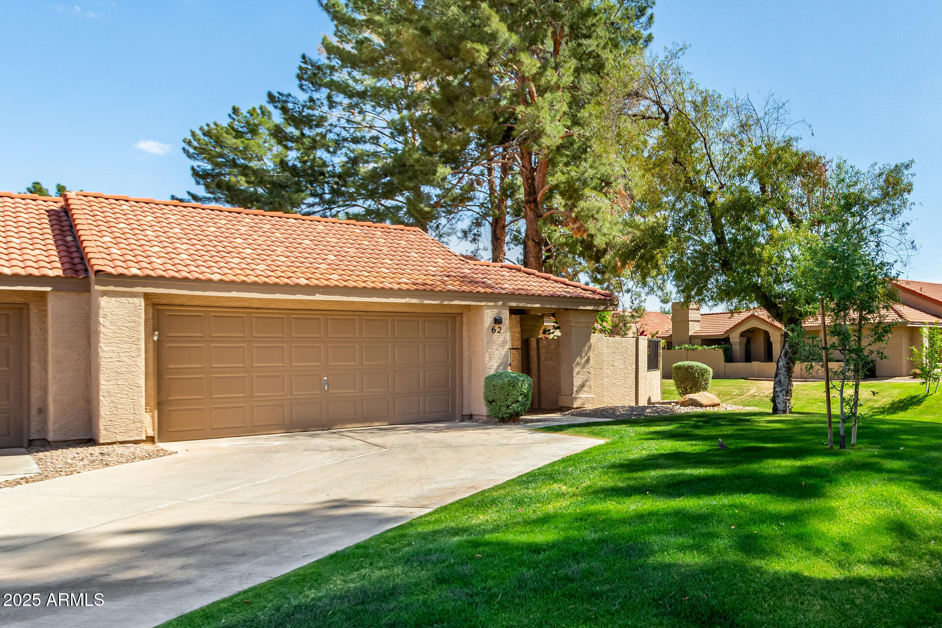 945 North Pasadena, Unit 62 Mesa, AZ 85201 - Photo 30 of 30 a front view of house with yard
