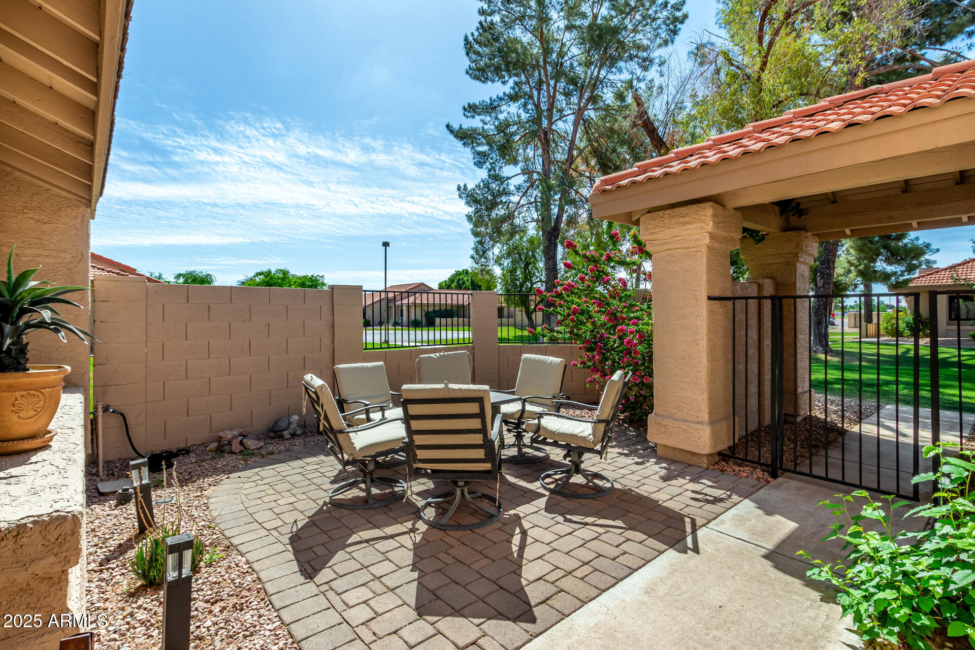 945 North Pasadena, Unit 62 Mesa, AZ 85201 - Photo 4 of 30 a backyard of a house with seating space