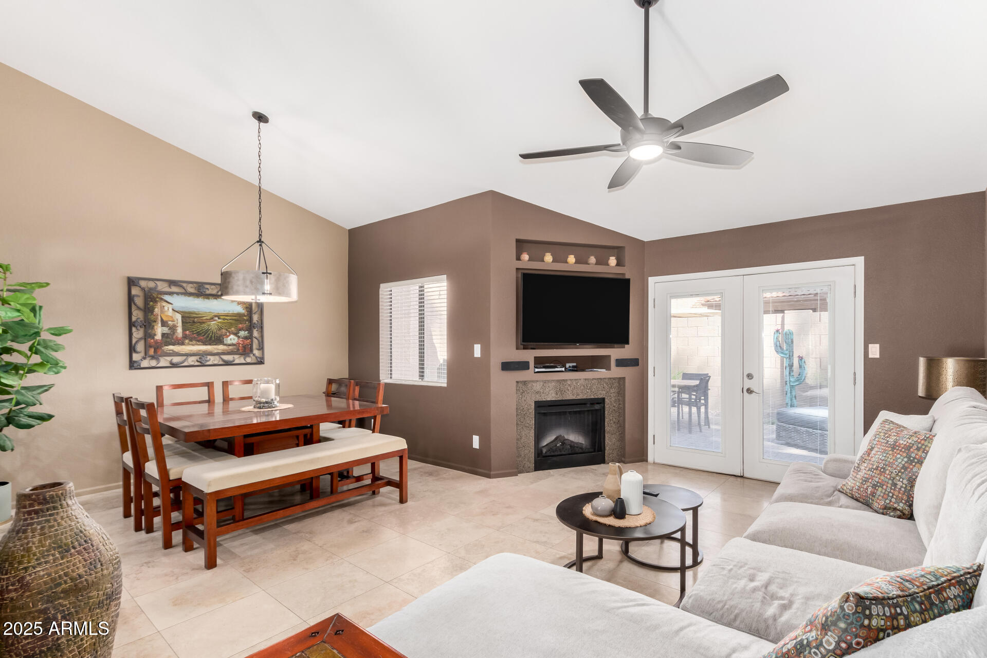945 North Pasadena, Unit 62 Mesa, AZ 85201 - Photo 8 of 30 a living room with furniture and a flat screen tv