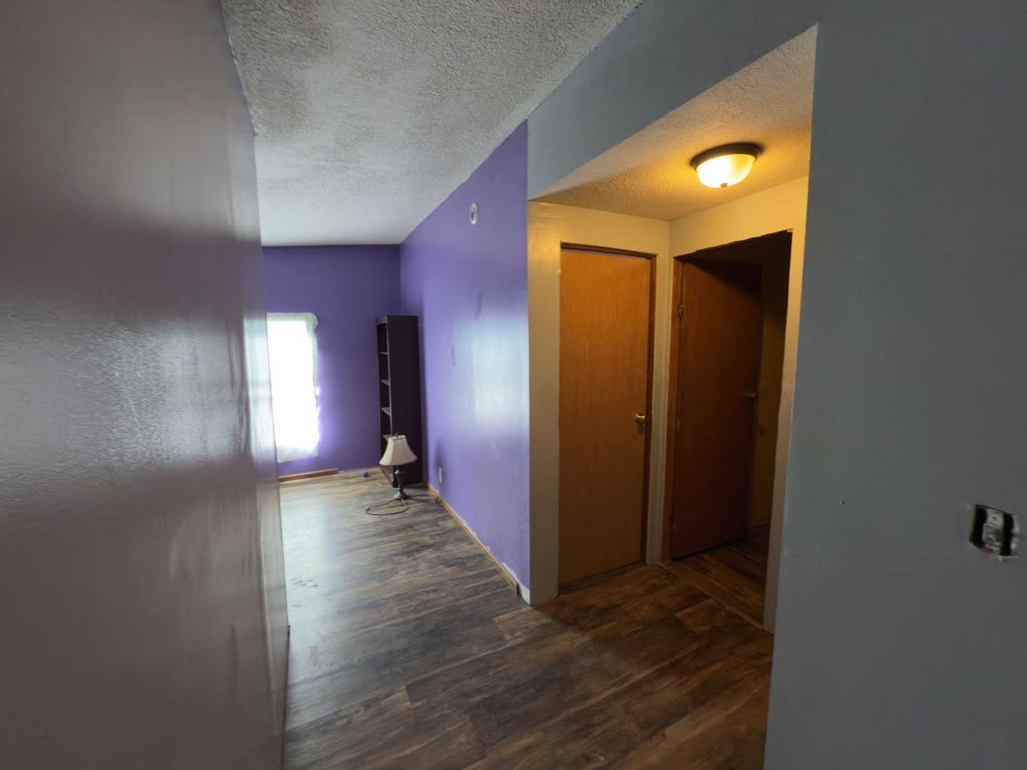 1995 Schuyler Avenue, Unit D25 Kankakee, IL 60901 - Photo 11 of 13 a view of empty room with wooden floor