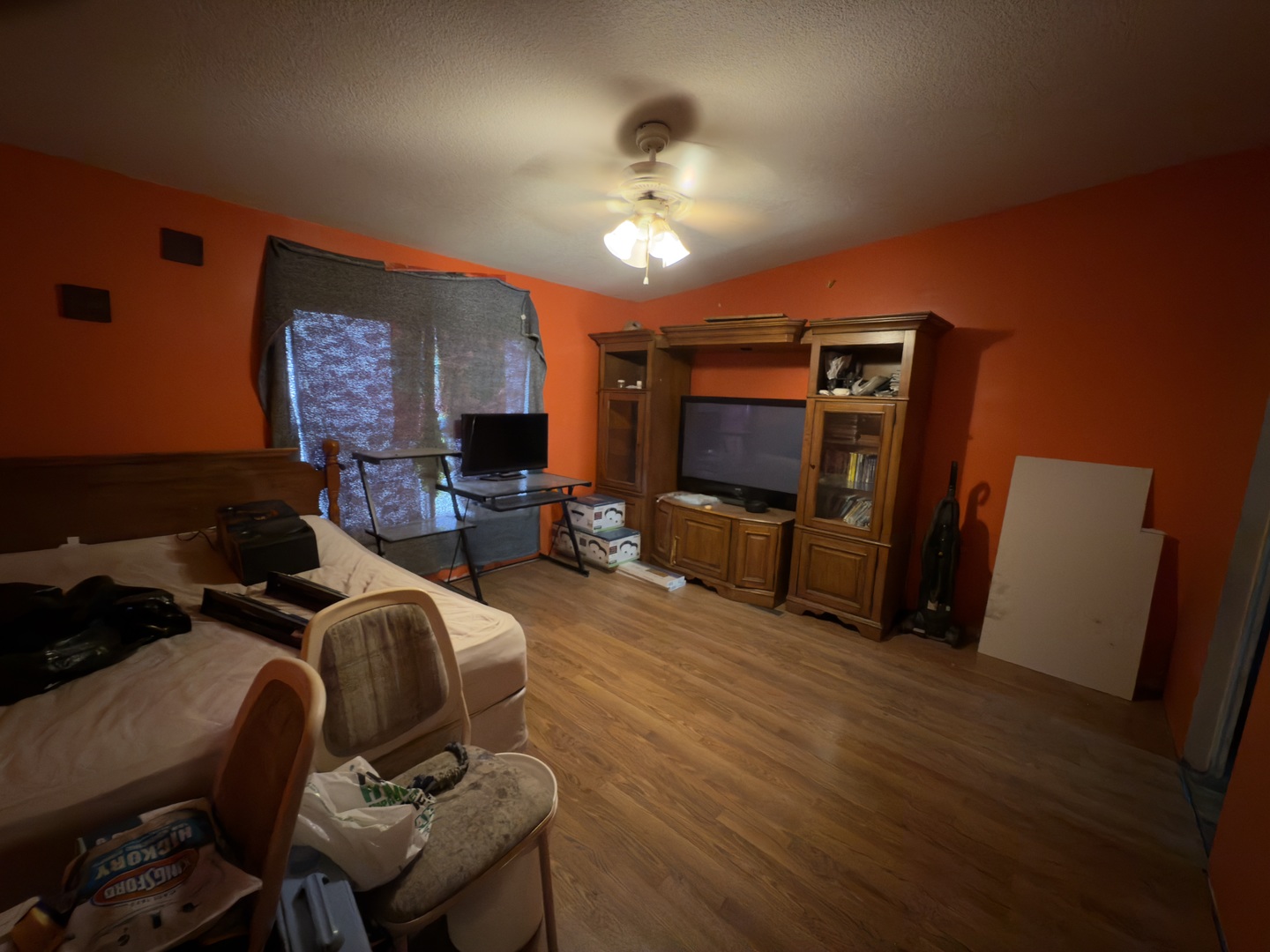 1995 Schuyler Avenue, Unit D25 Kankakee, IL 60901 - Photo 7 of 13 a living room with furniture and a flat screen tv