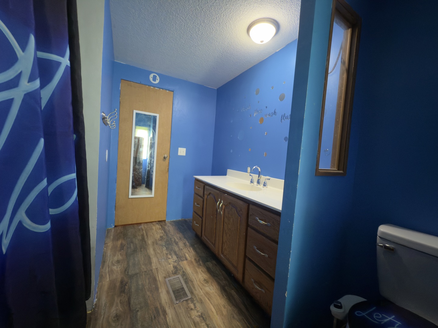 1995 Schuyler Avenue, Unit D25 Kankakee, IL 60901 - Photo 9 of 13 a bathroom with a sink vanity and mirror