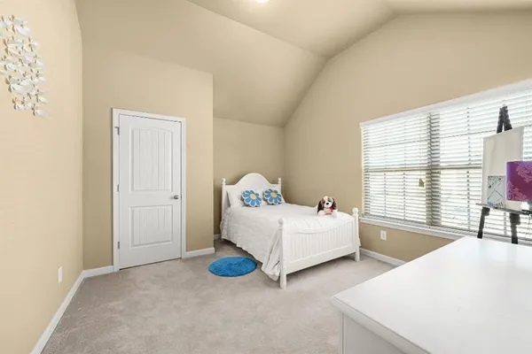 a kitchen with stainless steel appliances granite countertop a stove a refrigerator a sink and dishwasher