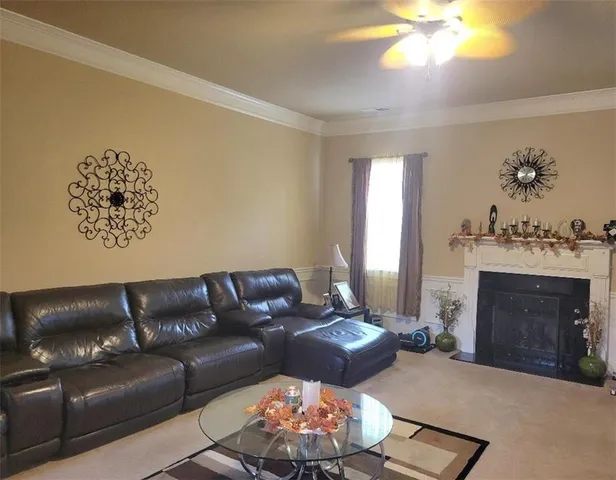 a kitchen with stainless steel appliances granite countertop a stove a refrigerator a sink and dishwasher