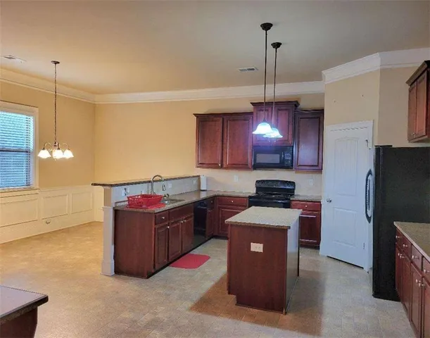 a dining room with furniture and a table