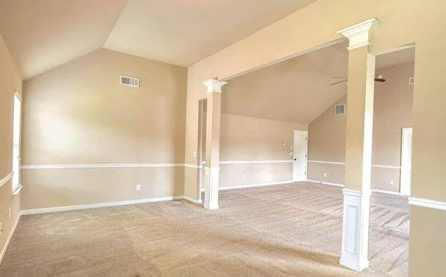 a sign that is sitting on a brick wall