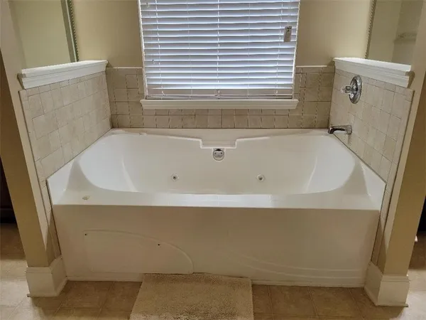 a bathroom with a bathtub
