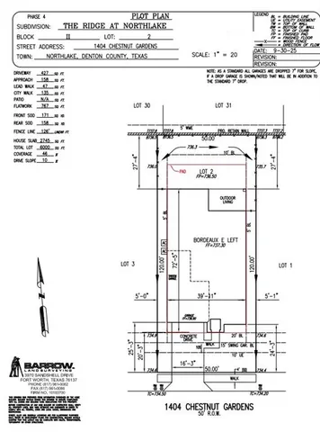 a living room with furniture and a lamp